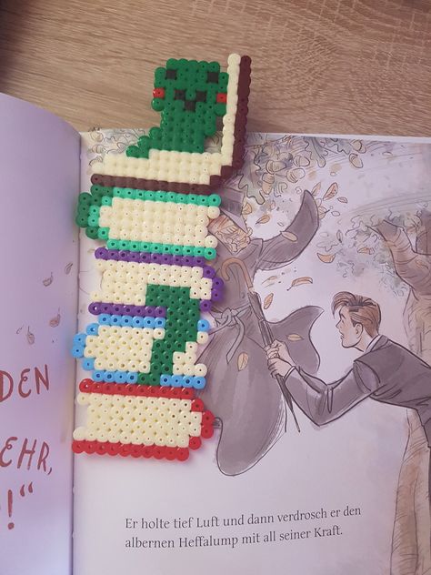 This bookworm just loooves books. Maybe even as much as you do! <3 Perler Bead Bookmarks, Picture Bookmark, Library Lounge, Perler Bead Designs, Bead Templates, Easy Perler Beads Ideas, Beads Patterns, Art Perle, Perler Bead Templates