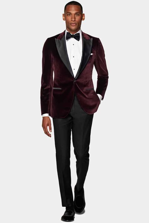 Men's black tie attire with a twist. Dinner jacket switched for a burgundy velvet jacket. This outfit first appeared in the article: How A Man Should Dress For A Wedding: From Groom To Guest, on MensFlair.com Mens Black Tie Attire, Party Dress Outfit, Creative Black Tie, Velvet Dinner Jacket, Dress Outfits Party, Black Tie Optional, Black Tie Attire, Mens Wedding Attire, Black Tie Formal