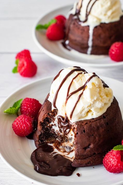 Warm, rich, indulgent lava cake is the perfect dessert to finish off any romantic dinner. Easy to make and comes together in just 30 minutes. Top with vanilla ice cream and fresh raspberries for a dessert that is sure to impress! I am a chocolate lover through and through! And I absolutely love chocolate lava cake. I remember having my first lava cake at a nice restaurant my husband and I went to on one of our date nights . I thought about trying to make lava cakes myself at home, bu… Lava Cake Recipes, Molten Lava Cakes, Molten Chocolate, Chocolate Lava, Chocolate Lava Cake, Lava Cake, Fresh Raspberries, Chocolate Butter, No Bake Bars