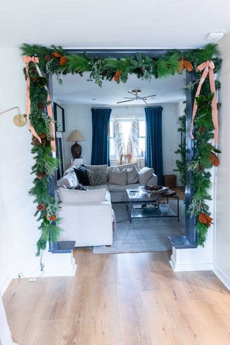 Holiday Kitchen and Archway Decor – Rashida Banks Indoor Arch Christmas Decor, Entryway Christmas Decor Ideas, Wooden Arch Christmas Decor, Decorate Archway In Home, Archway Garland, Archway Christmas Decor, Christmas Decor Arched Doorway, Christmas Ornament Archway, Arch Christmas Decor