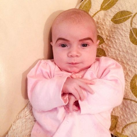 Six-week-old Isabella was asleep when her mum decided to draw eyebrows on her face. Realborn June 7 Months Asleep, Draw Eyebrows, Babywise Sleep Schedule, Baby Funny, Fife Scotland, How To Draw Eyebrows, Birthday Cake Pictures, Becoming A Teacher, Party Pictures