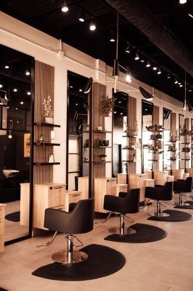 2023 SALONS OF THE YEAR Finalists Announced - Awards & Contests - Salon Today Unique Hair Salon, Hair Salon Stations, Modern Barber Shop, Salon Reception Area, Barbershop Design Interior, Hair Salon Interior Design, Barber Shop Interior, Rectangular Face, Curly Extensions