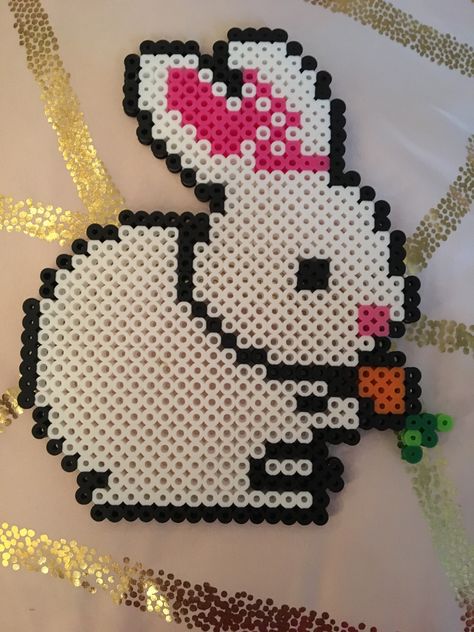 I made this adorable bunny out of perler beads!! So cute Perler Bunny, Perler Bead Easter Patterns, Pearler Bead Patterns Bunny, Rabbit Perler Bead Pattern, Perler Easter, Easter Hama Beads, Pearl Beads Pattern, Melty Bead Patterns, Perler Ideas