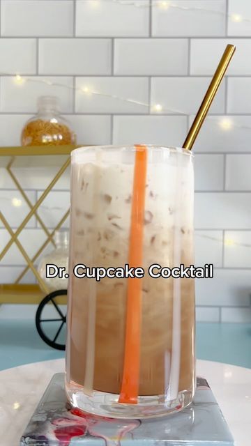 Marcela Romero on Instagram: "This one is for the sweet lovers! Dr. Cupcake cocktail is truly scrumptious. 🥤🍹✨ This inventive libation takes the familiar and beloved taste of Dr. Pepper and elevates it to new heights. A harmonious blend of cake and whipped cream vodka, a splash of heavy cream, and the unique flavor profile of Dr. Pepper creates a drink that’s as daring as it is delightful. It’s a sip of pure liquid innovation.🥤🍹✨ Dr. Cupcake Cocktail -1oz Cake vodka -1oz Whipped cream vodka -4oz Dr. Pepper -1oz heavy cream In a glass filled with ice, add the two types of vodka and Dr. Pepper. Top off with heavy cream and stir. Enjoy! #cocktails #drinks #drinkrecipe #holidaydrinks #holidayrecipes #gincocktails #cocktailsathome" Flaming Dr Pepper, Dr Pepper Cake, Types Of Vodka, Cake Vodka, Whipped Cream Vodka, Truly Scrumptious, Drink Recipe Book, Soda Drinks, Seasonal Drinks