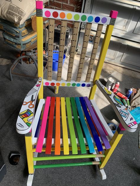 Teacher Rocking Chair Painted Rainbow, School Rocking Chair, Rocking Chair Teacher, Classroom Rocking Chair Diy, Classroom Rocking Chair Teachers, Teacher Painted Rocking Chair, Teacher Chair Ideas, Teacher Painted Chair, Teacher Rocking Chair Painted Diy