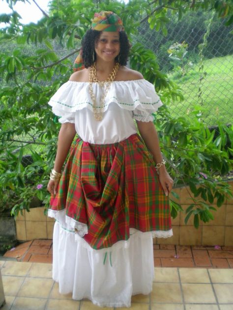 This is called the Creole dress. It is the traditional dress for girls in Dominica, it is a national symbol of Dominica. They wear this dress on Creole day, when they have parades, and many more. Caribbean Fashion, Caribbean Culture, National Dress, We Are The World, African Diaspora, Folk Costume, Western Outfits, Traditional Dresses, Traditional Outfits