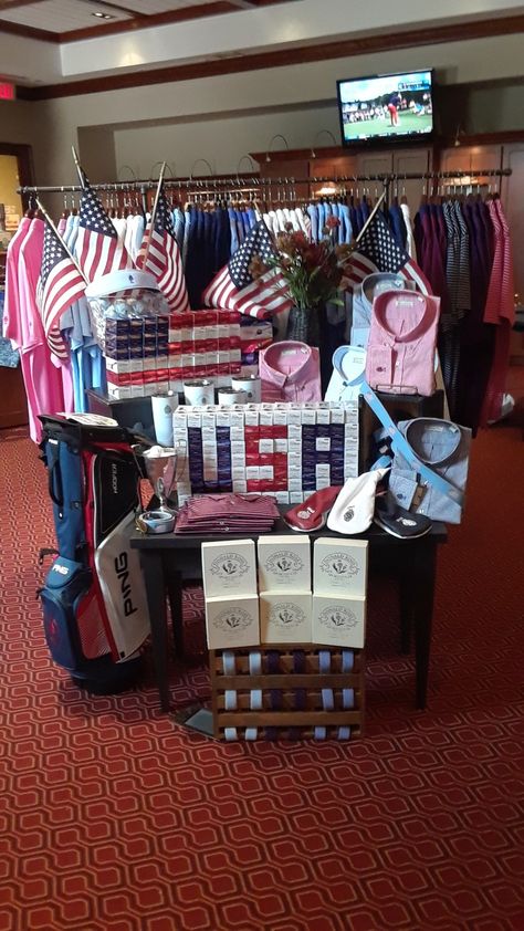 Retail golf shop display USA 4th of july Golf Shop Displays Visual Merchandising, Golf Display Ideas, Golf Shop Displays, Golf Merchandising, Golf Merchandise, Shop Merchandising, Clubhouse Ideas, Golf Pro Shop, Merchandise Display