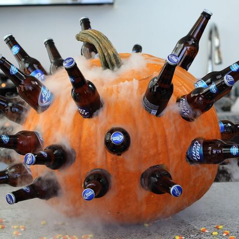 This Halloween Pumpkin Cooler is one of craziest Halloween party beer cocktails out there. This awesome boozy pumpkin keeps tons of beer cold with dry ice — dry ice that really sells the whole idea of Halloween beer! Pumpkin Cooler, Halloween Beer, Pumpkin Beer, Amazing Pumpkin Carving, Tipsy Bartender, Beer Cooler, Adult Halloween Party, Halloween Cocktails, Dry Ice