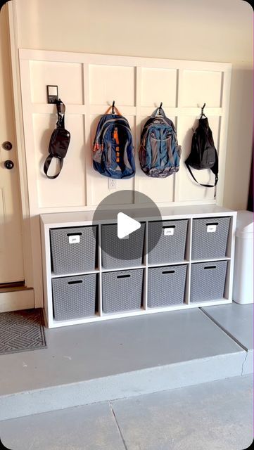 Betsy Dmitruk | Home Organizer on Instagram: "Cube storage, but make it cute 🥰 We don’t have a mudroom in our home, so the shoes and backpacks in the house were starting to drive me crazy. Enter: this inexpensive storage solution in our garage. What do you think of my DIY mudroom?? ⭐️Comment MUDROOM and I’ll DM you the products I used to make this space come to life!⭐️ . #garagemakeover #garageorganization #cubestorage #targetfinds #mudroomgoals @targetdoesitagain @loweshomeimprovement" Garage Bookbag Storage, Backpack Storage Drawer, Cube Shoe Storage Ideas, Diy Backpack Storage, Garage Shoe Storage Ideas, Backpack Storage Ideas, Bookbag Storage, Entryway Remodel, Garage Shoe Storage