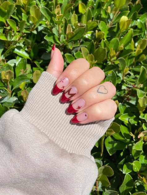 Scarlet witch/ Wanda Maximoff nails. Red French tip nails with stars and Wanda logo Wanda Inspired Nails, Wanda Maximoff Inspired Nails, Disney Marvel Nails, Scarlet Nails Design, Avengers Nails Designs, Marvel Avengers Nails, Iron Man Nails Designs, Marvel Nails Short, Scarlet Witch Inspired Nails