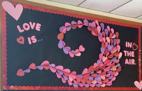 American Heart Month Bulletin Board, Love Is Bulletin Board, Love Is In The Air Bulletin Board Ideas, Love Is In The Air Bulletin Board, Heart Month Bulletin Board, Love Bulletin Board Ideas, Valentines Day Boards, Valentines Office Decor, Gymnastics Valentines