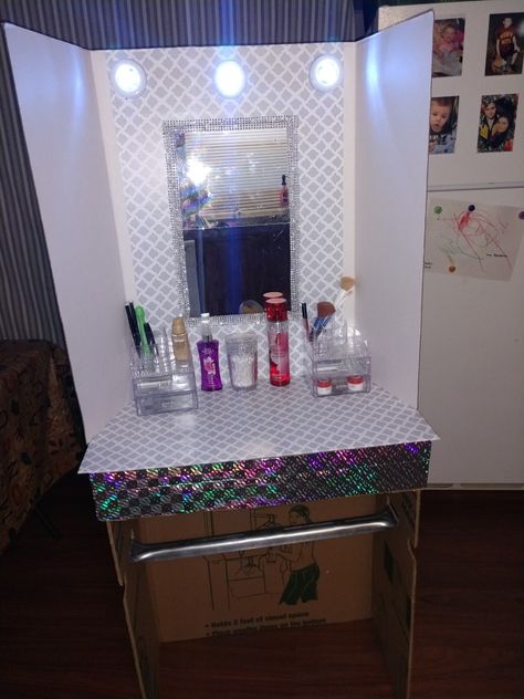 dollar tree  vanity  made of cardboard still need to paint bottom Dollar Tree Diy Vanity, Dollar Tree Vanity Ideas, Cardboard Vanity Diy, Dollar Tree Vanity, Cardboard Box Nightstand Diy, Dilly Dally Vanity Diy, Cardboard Shelf, Diy Vanity, Tree Diy