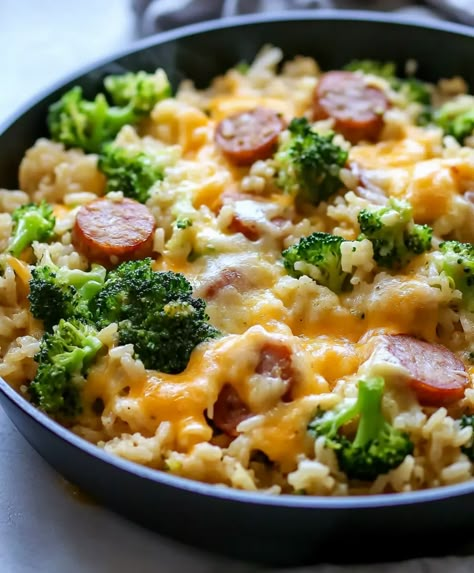 Cheesy Kielbasa Rice And Broccoli Skillet Recipe - sandyrecipes.com Kielbasa Broccoli Cheese, Kielbasa Broccoli Rice, Dinner Recipes With Sausage Kielbasa, Cheesy Kielbasa Rice And Broccoli, Kielbasa Veggie Skillet, Rice And Kielbasa Recipe, Kielbasa And Rice Recipes, Kielbasa Rice And Broccoli, Kilbasa Sausage Recipes