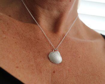 Sterling Silver Cockle Shell Necklace
Carry a piece of the ocean with you with this stunning cockle shell necklace, handcrafted from solid sterling silver. The shell charm is cast from a real cockle shell handpicked from Leigh-on-Sea beach, capturing every natural detail. Suspended on a delicate silver chain, this necklace is perfect for layering or wearing alone for a timeless, coastal-inspired look.
Made from solid sterling silver
Cast from an authentic cockle shell found on Leigh-on-Sea beach
Chain length 16-18"
Also available in 22ct gold plated
A beautiful gift for sea lovers and a perfect keepsake to cherish forever.sterling silvernullcockle shell 20mm width