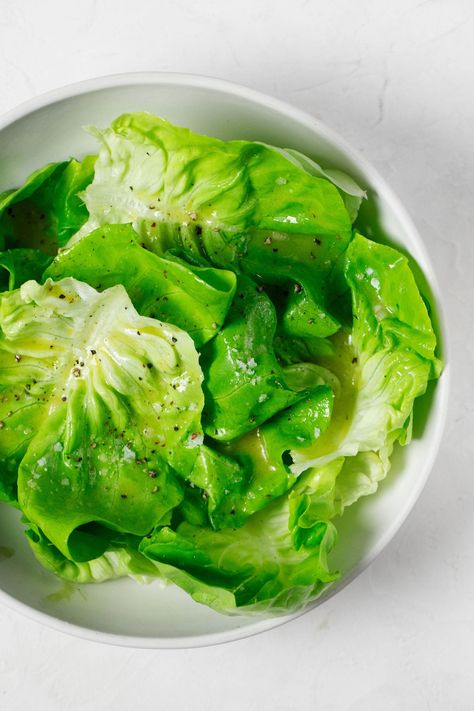 An overhead image of a round white bowl, which has been filled with a fresh green butter lettuce salad. Simple Butter Lettuce Salad, Boston Lettuce Salad, Butterhead Lettuce Recipes, Salads Green, Writers Studio, Simple Side Salad, Butter Lettuce Salad, Roasting Beets In Oven, Food Savory