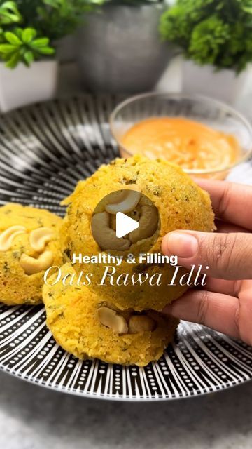 Aathira Sethumadhavan on Instagram: "Full recipe with macros ⬇️ Granted, these don’t taste like our regular white fluffy idlis - but they still taste good in a different way. ❤️ Oats Rawa Idli Ingredients (69 Kcal, 4g P, 2g F and 9g C per idli - makes 12 standard sized idlis) 1/3 cup powdered oats  1/3 cup + 1 tbsp besan  1/3 cup + 1 tbsp sooji (roasted) 50 g grated paneer  50 g grated carrot  1 tsp grated ginger  1 tsp chopped chilli  Chopped coriander leaves as required  About 180 g Greek yoghurt  Pinch of turmeric and chilli powder  Salt and water as required  1.5 tap ENO or baking soda  Few broken cashew nuts  1 tsp ghee for brushing steamer   Method 1. Mix together all ingredients as shown. Make sure to mix in the eno at the end and do not over mix after that.  2. Grease the steamer w Sooji Recipes, Macro Meals, Cooking 101, Coriander Leaves, Cashew Nut, Chilli Powder, Salt And Water, Ghee, Indian Food