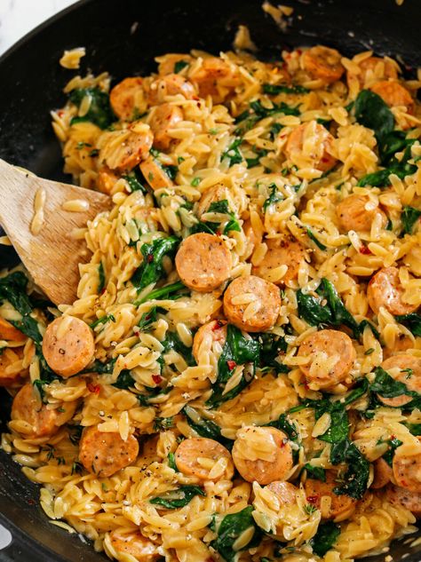 This Creamy Chicken Sausage Orzo Skillet is the perfect weeknight dinner that is easily made all in one pan in just 20 minutes! Healthy Dinner Recipes Chicken Sausage, Creamy Chicken Sausage Orzo Skillet, Orzo And Chicken Sausage Recipes, Cheddar Chicken Sausage Recipes, Chicken Apple Sausage Orzo Recipes, Chicken Sausage With Orzo, Creamy Chicken Sausage Orzo, Chicken Sausage Ideas, Orzo Sausage Spinach Recipes