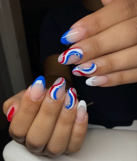 Fourth of July inspired nails. Almond Nails Fourth Of July, White Red And Blue Nails, White Nails With Red And Blue, French Tip Nails With Design Fourth Of July, Pretty Royal Blue Nails, 4th Of July Swirl Nails, 4 Of July Nails Gel, Red White Blue Gel Nails, July 4 Th Nails Designs