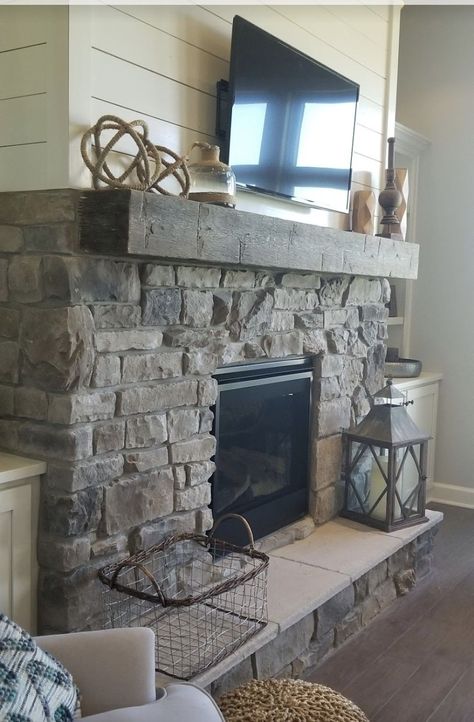 Farmhouse Fireplace Stone And Shiplap, Mantles On Stone Fireplaces, Shiplap Rock Fireplace, Stone Fireplace With Shiplap On Sides, Half Rock Half Shiplap Fireplace, Rock Hearth Fireplace, Stone Fireplace With Shiplap Above Mantle, Rock Fireplace With Shiplap, Fireplaces With Shiplap And Stone