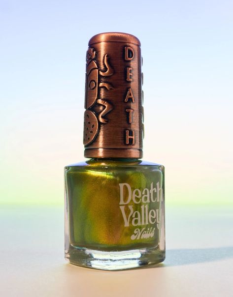 Green base with multichrome shimmery finish 10-free. Vegan. Cruelty-free. Nontoxic. We suggest using a base coat and 2-3 coats of polish followed by a top coat. This polish comes with a handmade decorative bronze cap on top of our standard black matte nail polish cap - merging artistry with function. To forego bronze caps on your order click here. Swatches by @eviltwinnails @polish.d_ @melanated.mani @melly.k.nails Green Nail Polish Colors, Tlou Oc, Medium Coffin Nails, Cosmetic Aesthetic, Cosmetology License, Getting My Nails Done, Opi Polish, Nail Polish Nails, Cuticle Cream