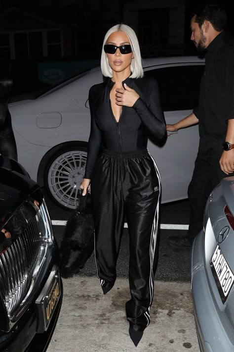 Kim Kardashian Elevates Classic Track Pants With Unexpected Shoes | Vogue Balenciaga Outfit, Track Pants Outfit, Gucci Gown, Kim Kardashian Outfits, Kardashian Outfit, Kim Kardashian Style, Tracksuit Pants, Balenciaga Track, Kardashian Style