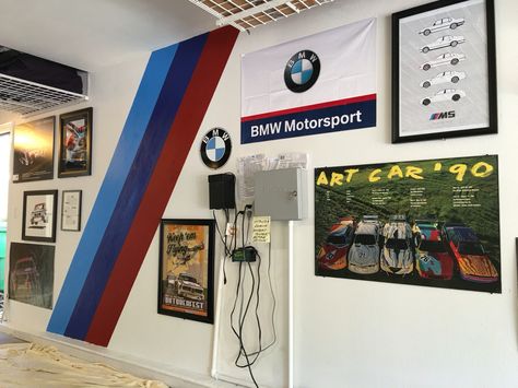 m stripes for bmw garage Bmw Garage, Auto Body Shop Office Ideas, Motocross Garage Ideas, Bmw Garage Ideas, Bmw Room Decor, Car Repair Shop Design Garage, Garage Paint Colors, Garage Paint, Garage Wall Storage