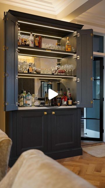 Daval Furniture on Instagram: "A hidden bar area in this luxury Oakley inframe kitchen in Charcoal makes for the ultimate entertaining space. Would you have a hidden bar area in your kitchen?  #kitchendesign #kitchenideas #kitchendesign #luxurykitchen #inframekitchen #luxuryhomes" Hidden Bar Cabinet, Built In Bar Cabinet, Inframe Kitchen, 2024 Family, Hidden Bar, Built In Bar, Entertaining Space, Drinks Cabinet, Bar Area