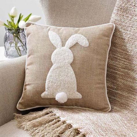 Easter Decorations For The Home That You'll Love: Rustic Easter bunny decorations - Bunny Pillow | Image © @Kirklands | Are you looking for DIY Easter decorations ideas? These Easter farmhouse decorations include Easter decorations table. Plus, if you’re after farmhouse decor or rustic decor and rustic Easter decorations, these ideas are brilliant. #easterdecorations #eastercrafts #easterdecor #diy #bunnydecorations #bunnycrafts #rustic #farmhouse Oster Dekor, Diy Osterschmuck, Rustic Easter Decor, Rabbit Pillow, Easter Pillows, Easter Craft Decorations, Bantal Sofa, Punch Needle Patterns, Easter Decorations Dollar Store