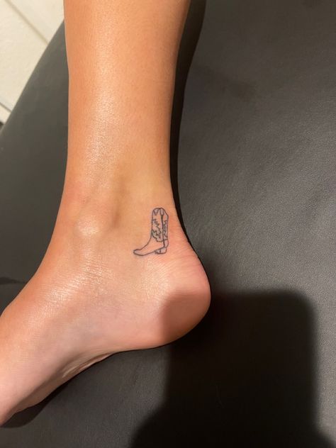 Cowboy Boot Tattoo Ankle, Cowboy Boot Tattoo On Ankle, Minimalist Tattoos Aesthetic, Cute Small Cowgirl Tattoos, Minimalist Cowboy Boot Tattoo, Mini Cowboy Boot Tattoo, Little Cowboy Boot Tattoo, Cowboy Boot Tattoo For Women, Tiny Cowgirl Boot Tattoo