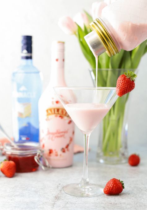 Strawberry Shortcake Martini | Simply Made Recipes Strawberries And Cream Martini, Baileys Valentines Day Drinks, Bailey Strawberry And Cream Recipes, Valentines Martini Drink Recipes, Pink Valentines Cocktails, Strawberry Shortcake Martini, Strawberry And Cream Baileys Drinks, Strawberry And Cream Cocktail, Strawberry Shortcake Cocktail