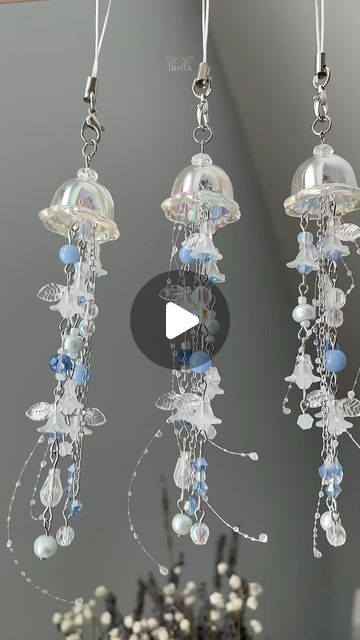 lavila🌱 on Instagram: "Rainy jellyfish phonecharm🪼 #phonecharm #jellyfish #jewlerymaking #beadedjewelry" Jellyfish Windchime, Beaded Jellyfish, Graduation Designs, Jellyfish Jewelry, Diy Jellyfish, Beaded Charms, Blue Jellyfish, Fish Beads, Graduation Design