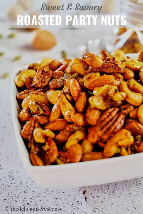 These sweet and savory roasted party nuts with cardamom, saffron and maple syrup are simply divine and irresistible. They are so addictive, that you won’t be able to stop with a handful. Everyone just loves these nuts! An easy, healthy, gluten free, vegetarian recipe of nuts mixed with spices and baked in oven. A quick and simple homemade treat that can make great holiday gifts. #nuts, #roastednuts #holidaynuts Roasted Nuts Recipe, Saffron Recipes, Chickpea Cookies, Baked Dinner, Low Carb Appetizers, Delicious Gluten Free Recipes, Nut Recipes, Roasted Nuts, Vegetarian Recipe