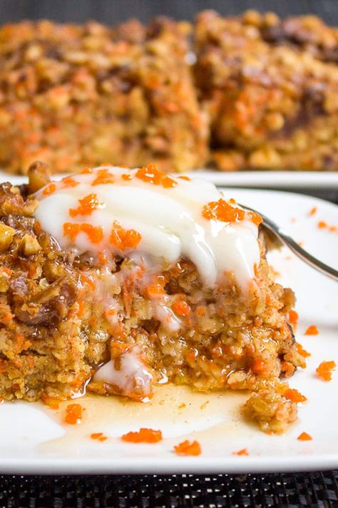 A dollop of yogurt and drizzle of maple syrup make this baked carrot cake oatmeal crazy good. Satisfying, nutritious and super convenient. Bake it, cut it into squares, freeze it, then heat it in the microwave for 1 minute when you want a quick on-the-go healthy breakfast or snack. Oatmeal Squares, Carrot Cake Oatmeal, Baked Carrots, Baked Oatmeal Recipes, Nutritious Recipes, Oatmeal Breakfast, Baked Oats, Make Ahead Breakfast, Oatmeal Recipes