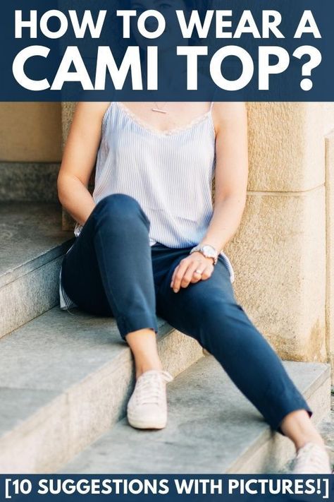 Outdoor portrait of beautiful woman wearing camisole top and jeans sitting on stairs. The camisole, also known as a cami top or cami is an incredibly versatile piece of clothing to have in your closet. It can be worn alone, used for layering, or to add an accent of color or texture to an outfit. Read our guide to know the best way to wear a cami top. Bra Top And Jeans Outfit, Bra For Cami Top, White Camisole Outfit, White Cami Outfit, Silk Camisole Outfit, Silk Cami Outfit, Camisole Top Outfit, Sitting On Stairs, Camisole Outfit