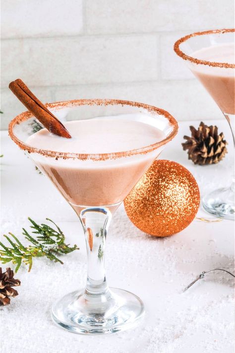 The Eggnog Martini recipe takes ordinary eggnog and mixes it with vanilla vodka, amaretto and more. The result is a lighter version of eggnog with a wonderful flavor. Egg Nog Martini, Eggnog Martini Recipe, Christmas Cocktails Vodka, Eggnog Martini, Festive Cocktail Recipes, Eggnog Cocktail, Christmas Drinks Alcohol Recipes, Christmas Eggnog, Christmas Drinks Alcohol