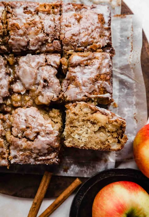 Indulge in the ultimate autumn dessert with our Apple Fritter Cake! 🍏🍰 Bursting with cinnamon-spiced apples, moist cake, and a sweet glaze, this recipe is pure comfort in every bite. Perfect for fall gatherings or a cozy treat anytime. 😋 #AppleFritterCake #DessertRecipes #FallBaking Apple Fritters Cake Recipe, Apple Fritter Cake, Moist Apple Cake, Apple Spice Cake, Apple Coffee Cakes, Apple Fritter, Apple Cake Recipes, Apple Fritters, Coffee Cake Recipes