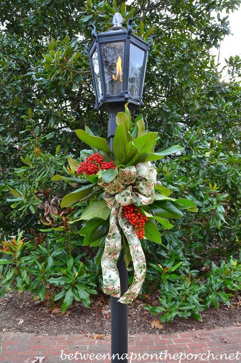 Decorate a Lantern for Christmas with Greenery from the Garden Decorating A Lantern For Christmas, Christmas Lamp Post, Mailbox Decor, Christmas Lamp, 12 December, Christmas Greenery, Christmas Arrangements, Christmas Lanterns, Christmas Porch