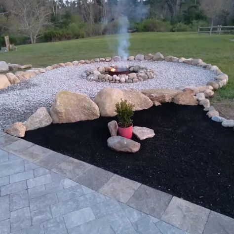 Stone Path To Fire Pit, Pebbled Fire Pit Area, Backyard Beach Fire Pit, White Rock Fire Pit Area, Fire Pit Gravel Ideas, Large Rock Fire Pit, Backyard Stone Fire Pit Ideas, Fire Pit Stones Rocks, Stone Fire Pit Ideas Backyard