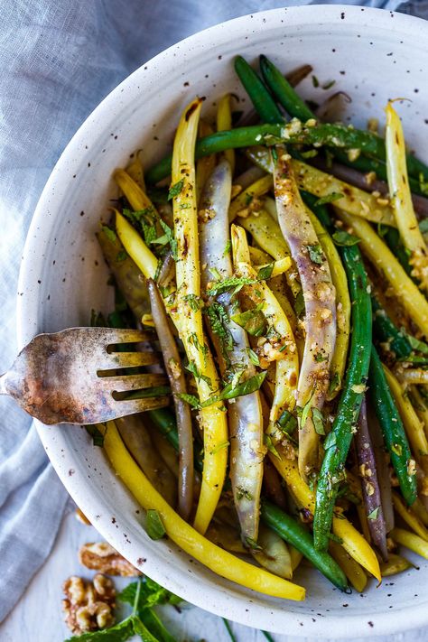 Green beans with Toasted Walnut Vinaigrette, a simple, delicious side dish that will enhance almost any meal.  Vegan and Gluten-free. Vegan Green Bean Recipes, Blistered Green Beans, Feasting At Home, Easy Green Beans, Lemon Green Beans, Sauteed Green Beans, Frozen Green Beans, Fresh Green Beans, Green Bean Recipes