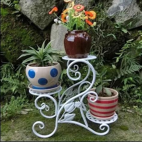 Pot stand 🌿🌻 | Garden decor ideas #potstand #flowerpot #flowerpots #flowerpotstand #homedesignsdworld #decorativegarden #ironpotstand #cookinghacks Large Flower Vases, Flower Shelf, Flower Pot Stand, Indoor Balcony, Support Pour Plante, Balcony Flowers, Plant Stands Outdoor, Garden Stand, Balcony Plants