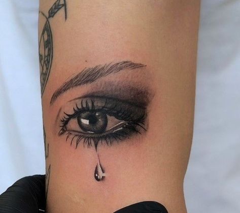 Black With White Tattoos, Eye Tattoo With Tear, Tear Eye Tattoo, Teardrop Tattoo Design, Crying Eye Tat, Eye With Tear Tattoo, Tear Tattoo, Teardrop Tattoo, Blood Tattoo