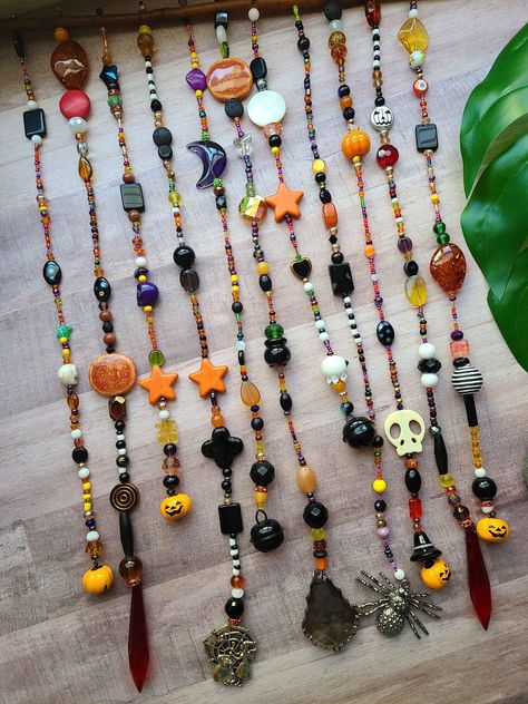 A hand beaded wind chime made with glass beads and other embellishments perfect for your minimalist or maximalist style. Makes a beautiful gift for anyone with a window :) Wall Decor Hanging, Beaded Hanging Decor, Beaded Wind Chimes, Home Made Wind Chimes, Beaded Wall Hanging, Halloween Inspired Beaded Jewelry, Beaded Wind Chimes Diy, Beaded Decor, Bead Garland