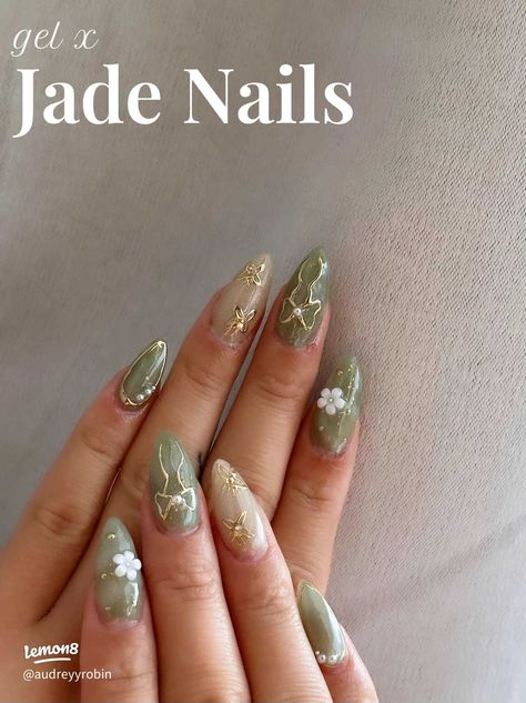 jade nails💚🤍 | Gallery posted by AUD | Lemon8 Cute Subtle Nail Designs, Sage Green Nails Inspiration, Cute Almond Nails Green, Jade Nails Designs Almond, Moss Green Nails Acrylic, Jade Almond Acrylic Nails, Gold Brown Nails Design, Jade Short Nails, Sage Green Nails With Charms