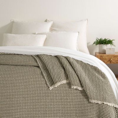 Warm and inviting, this extra layer for your bed is lofty, frothy, and woven in Portugal to look and feel like the softest of sweaters. In a buttery blend of cotton and soft wool, this whisper-weight waffle stitch blanket is made extra comfy and cozy with parallel ridges of tucked ribs for a feast of lightweight texture and insulating comfort. An award-winning interior designer and principal, to reflect her signature style of timeless elegance and innovative simplicity. Size: 71" W x 91" L, Colo Sage Blanket, Waffle Stitch Blanket, Pine Cone Hill, Stitch Blanket, Annie Selke, Queen Blanket, Waffle Stitch, Dash And Albert, Twin Blanket