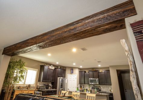 Wood Beam Over Doorway, Beam Header Doorway, Wood Header Beam, Faux Beam Doorway, Living Room Kitchen Divider, Beam Wrap, Beams Living Room, Kitchen Bar Design, Faux Beams