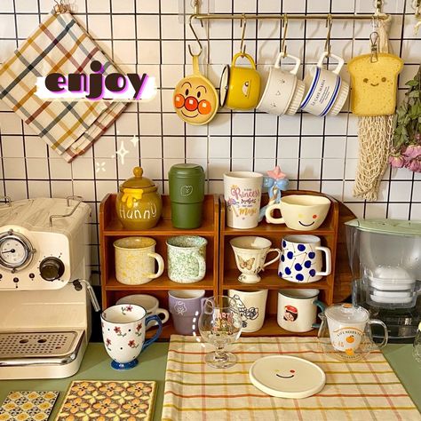 I have always dreamed of such a lovely kitchen corner with all my favorite cups. I would love to wake up eveyr morning, choose a cup that fits my mood that day, make some coffee and have breakfast while listening to my favorite music. How about you? #comment #kitchen #mugs #teacups #cups #coffee #kitchencorner #lovelykitchen #brightkitchen #vintagekitchen #lovelycups #lovelymugs #cupboard Coffee Cup Collection, Breakfast Corner Ideas, Cute Mug Display, Coffee And Tea Corner Ideas, Decorate Small Kitchen, Cottagecore Coffee Bar, Mug Cupboard, Coffee Corner Aesthetic, Mug Collection Aesthetic