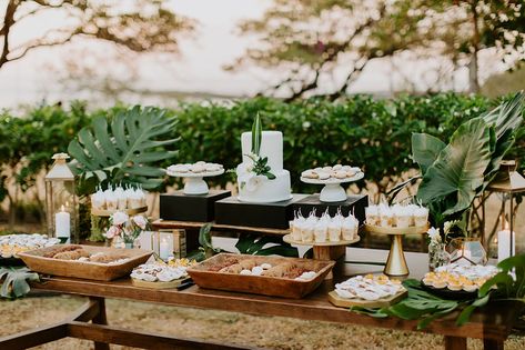 Tropical Dessert Table - Tropical Occasions Tropical Wedding Buffet, Beachy Dessert Table, Hawaiian Dessert Table Ideas, Tropical Dessert Table Ideas, Tropical Dessert Table Wedding, Forest Green Dessert Table, Tropical Buffet Table, Tropical Buffet Table Decor, Hawaiian Dessert Table