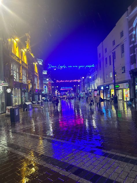 Rainy. City. Leeds. Trinity. Leeds trinity. Blue lights. Yellow lights. Rain. Puddles. Neon lights. City lights. City rain. Night time. Rainy city night. Reflection. Puddles. Cold. Winter. Winter rain. City winter. Leeds Nightlife, Rainy City Night, Lantern Parade, Rain Night, Night Reflection, City Rain, Rainy City, Blue Lights, City Night