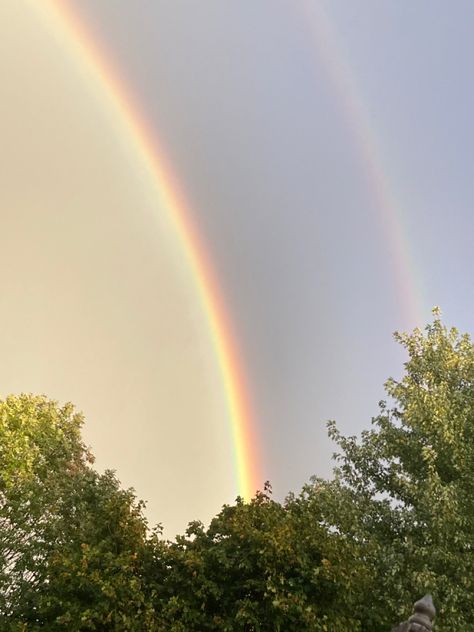 taking up about 1/4 of the bottom of the image are leafy green trees. the rest of the photo of the image is a double rainbow, the one on the left being brighter than the other Double Rainbow Aesthetic, Springtime Aesthetic, Double Rainbows, Spring Moodboard, Jesus Aesthetic, Vibe Board, Spring Rainbow, God's Promise, Double Rainbow