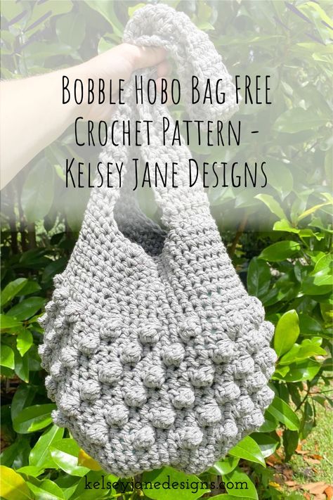 The Bobble Hobo Bag is the perfect bag for summer and works up quickly in a weekend! Using 2 strands of Lily Sugar n' Cream yarn your bag will be super durable and ready for your next adventure. This bag is super easy to make and you'll find yourself done in no time. Inspired by The Sak 120 Hobo bag. Sugar N Cream Yarn, Bag Free Pattern, Hobo Bag Patterns, Crochet Bag Pattern Free, How To Make Purses, All Free Crochet, Bobble Stitch, Crochet Bag Pattern, Boho Bag